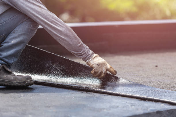 Professional Exterior Waterproofing technician working in Columbia, SC